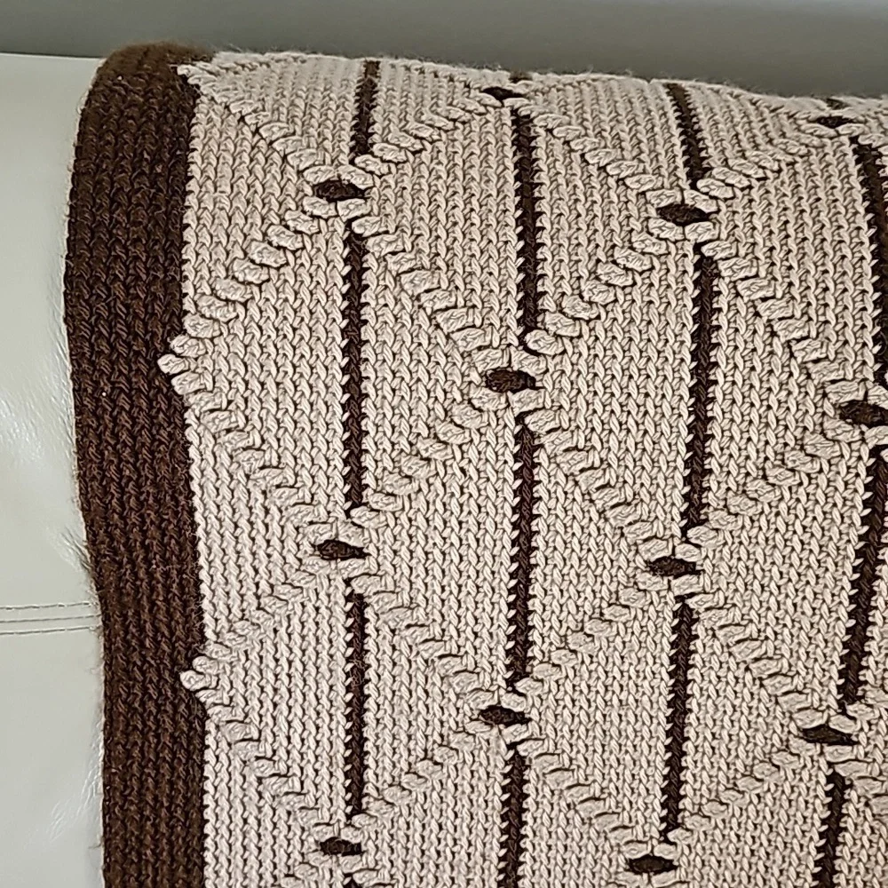 Hand Crocheted afgan. Brown and tan. Beautifully crafted. About 60